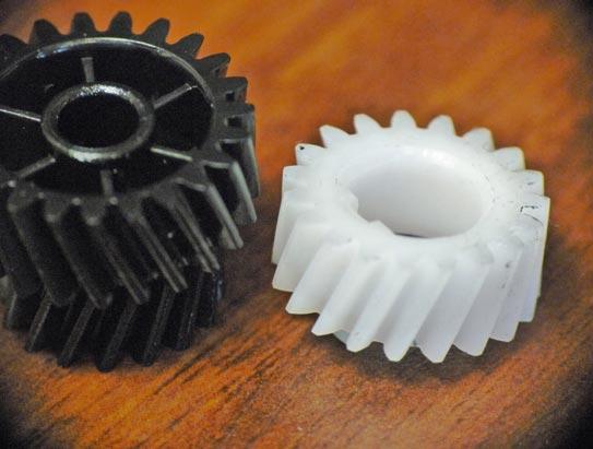 Shown are the two old and new gears.