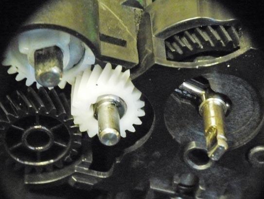 gears, old and new as installed in the cartridge.