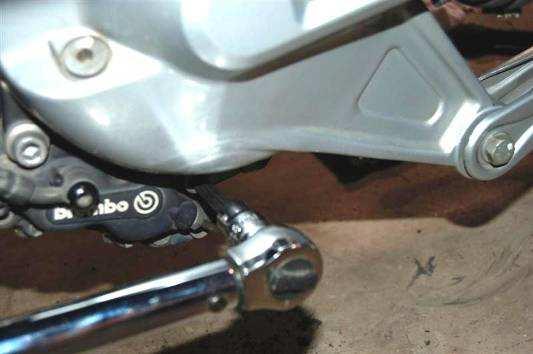 1. Install the rear brake caliper using
