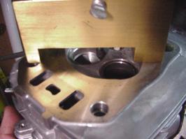 C. Measure from surface of head to lowest machined area in the