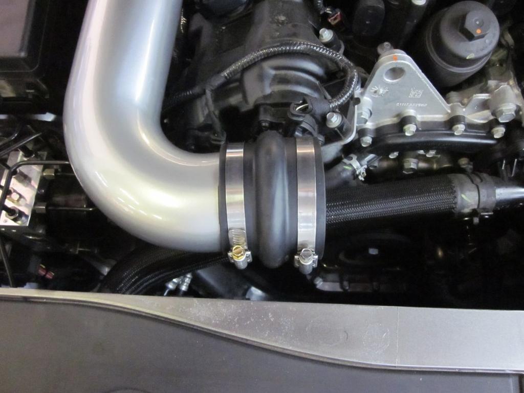 PART NUMBER 77070045AB v) Install the 3 ¼ ID end of the supplied hump hose onto the throttle body