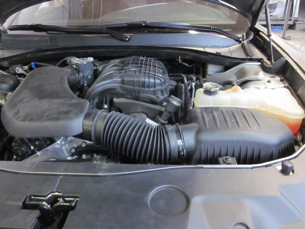 1) Getting Started a) If engine has run within the past two hours, open the hood and allow it to cool down. b) Make sure the vehicle is parked on a level surface.
