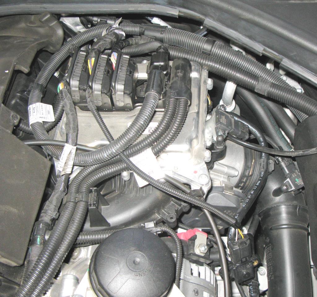 Supplemental instructions for cars with Pressure Sensor in Vent Line. Figure 36 shows the ECU with the wire coming from connector 2B to the pressure sensor attached to the vent hose.