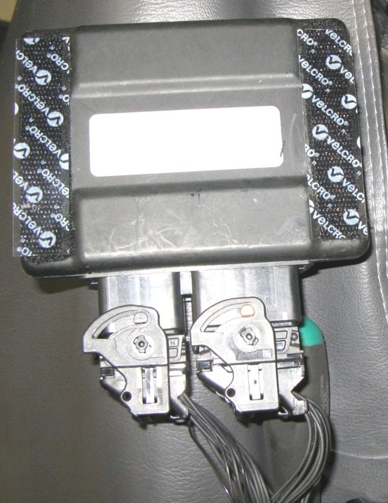 5. Attach Velcro strips using the double stick tape to the back of the DPT ECU.