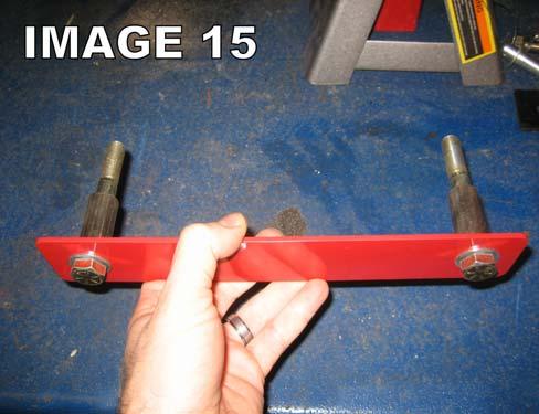 reinforcement inserts. Using either a ¾ drill bit or a step bit (much easier), enlarge ONLY the outer holes in the frame rail. (Image 14) 26.