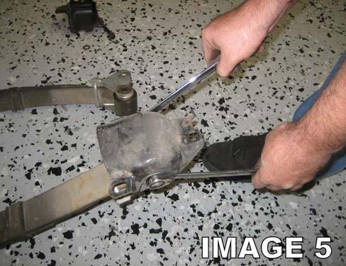 12. Once all bolts are removed, remove the leaf springs, leaving the rear end in its original position. 13.