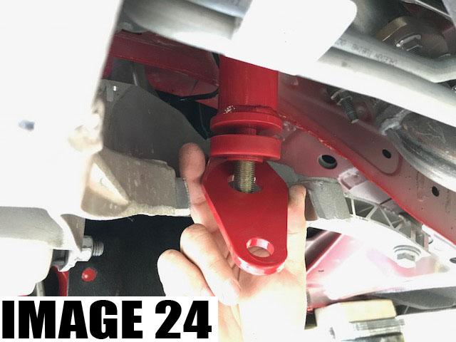 7. Install upper bushing and motor mount plate using 15mm socket and swivel head ratchet as shown in