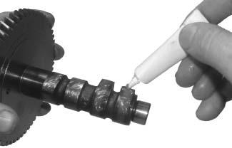 Apply Camshaft Lubricant to Cam Lobes. 2. Position the timing mark of the crankshaft gear at the 12 o clock position.