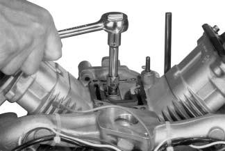 Install the new breather gasket. Figure 11-55. Connect Leads on SMART-SPARK Ignition Modules.