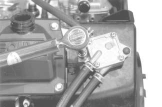 Section 11 Reassembly Metal-Cased Pulse Fuel Pump Figure 11-75. Installing Carburetor Assembly.