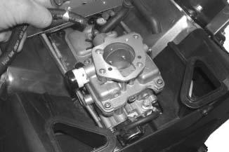 Carburetor Float Adjustment. 8. Once the proper float height is obtained, carefully lower the carburetor air horn assembly onto the carburetor body, connecting the choke linkage.