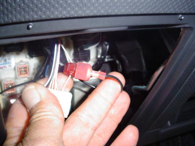 (r) Attach T-tap connector to GRAY wire (pin #8) with needle-nose pliers.