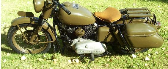 This 1958 XLA incorporates a much larger air filter, mudflaps on the front fender, and