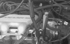 Attach the cable at least 18 inches (45 cm) away from the dead battery, but not near engine parts that move.