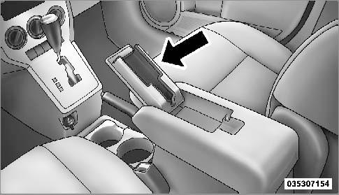 UNDERSTANDING THE FEATURES OF YOUR VEHICLE 153 WARNING! Do not operate this vehicle with the console compartment lid in the open position.