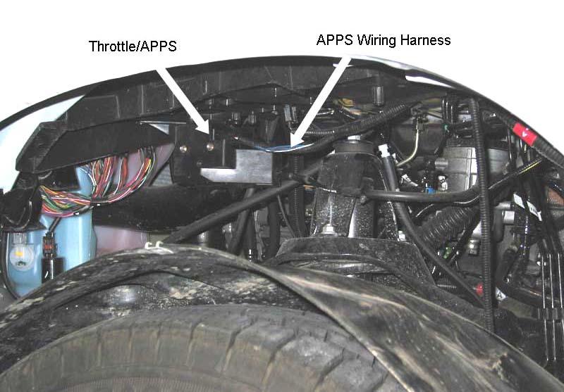 Connect the yellow wire from the DFIV module to this Posi-Tap and reconnect the APPS connector. Reinstall the throttle linkage cover. NOTE: On some truck configurations (i.e. 2003 RAM 3500) the throttle cable/apps will be located UNDER the driver side battery tray and is accessible by removing the inner fender skirt.