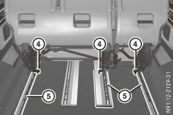 Seats 105 : Backrest release handles ; Release handles for rear seat anchorage = Grab handles?