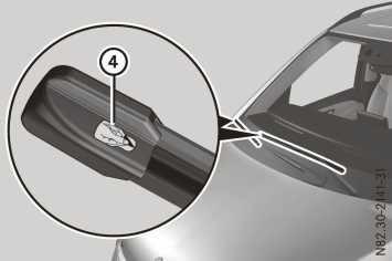 Lights and windscreen wipers X Remove wiper blade = from wiper arm by pulling it in the direction of the arrow. X Remove protective film?