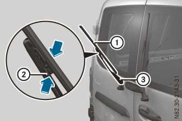Windscreen wipers 131 Rear doors X Fold wiper arm = away from the rear window. X Press both retaining clips ; together in the direction of the arrow and swing wiper blade : away from wiper arm =.