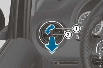 X To adjust the air direction: hold side air vent by control : or ; and move it up or down. X Using thumbwheel = or? move centre air vent to the left or right.