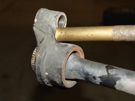 It may be necessary to use a Brass Drift or similar to remove the Anchor Arm.