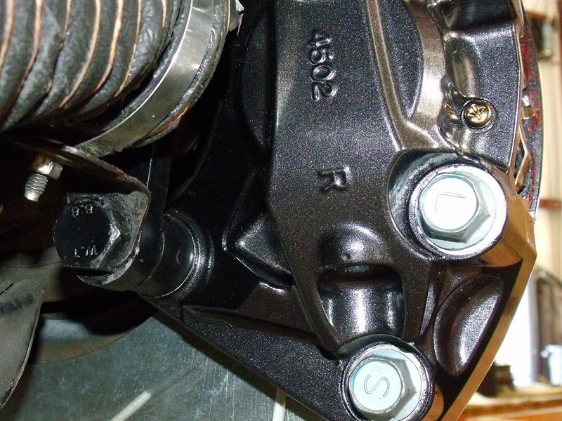13. Assemble the Front Brake Calipers before installing them onto the vehicle. Installation Note #4: If you are using an upgraded, NON-Nissan Brake Pad, you will NOT use the included shims.