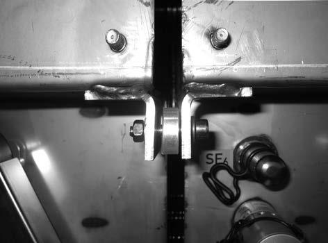 compartment), dished washers and nuts (figure 2.3.2.5). Initially, only lightly tighten the bolt connection.
