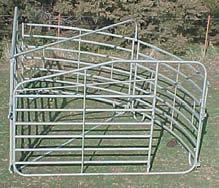 Calving Chutes are used for More than Just Calving Winkel Back Stop Anti-Backup bolts on top of panel.