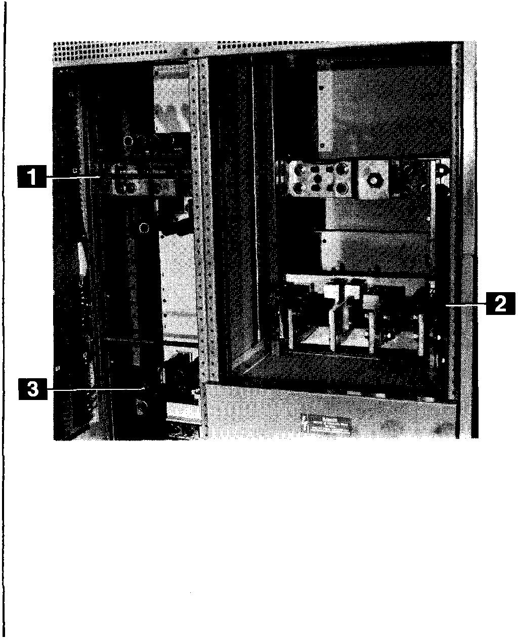 When specified, racks (1), Fig. 3-28, for the support of feeder cables are located in the cable compartment. The actual support of the cables is provided by lashing them to these racks.