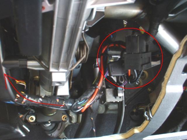 The picture above shows the relay position, blade fuse holder etc, tie/tape up all the loose cables neatly and thread the smaller black and brown cables with the existing loom in the direction of the