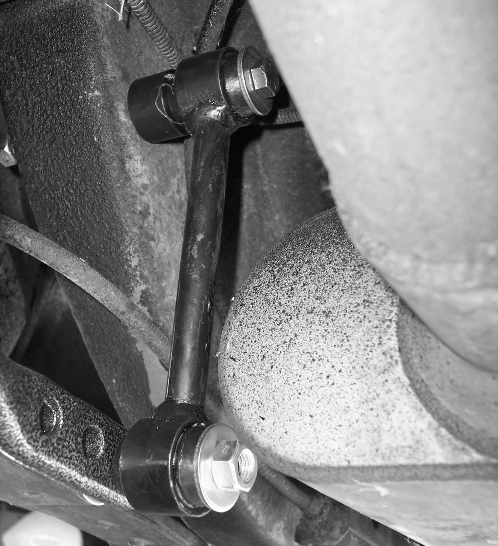 When spacers are properly fitted, remove bolt and spacer and attach end link to subframe as shown in detail and PHOTO 11.
