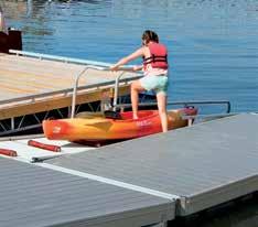 a 7 universal track-style frame and composite or Ipe decking. Features boarding handle and grab and launch rails.