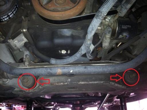 11. Remove the steering rack from the front of the K-member using a 15mm socket on the 2 front bolts and an 18mm deep socket and extension on the 2 nuts on