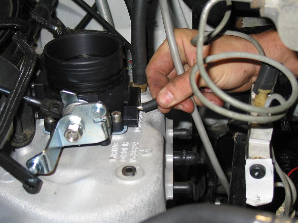 3.14 Connect the PERFECT System MAP sensor vacuum hose to the nipple on the side of the new throttle body. See Figure 4.