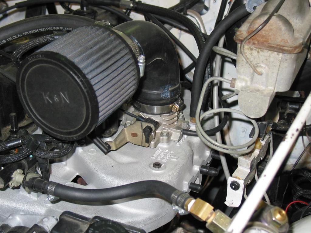 3.0 INSTALLATION GUIDELINES 3.1 Remove intake tube and air filter. NOTE: The picture shown is not the stock intake tube or air filter. See Figure 3-1.