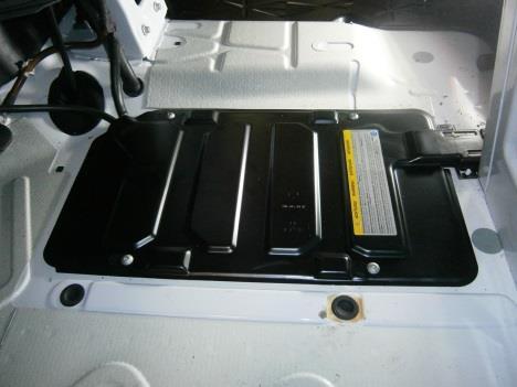 Remove the hatch from the driver s side floorboard