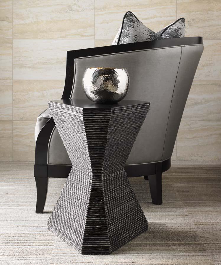 The triangular Topaz accent table is one of those irresistible pieces