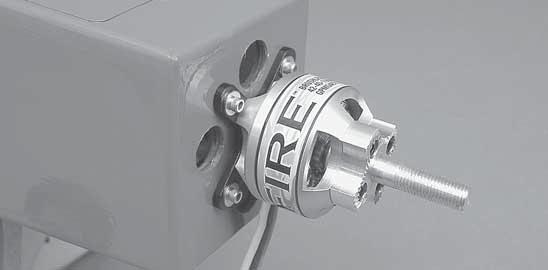 Push the motor wires through the cooling hole cutout on the fi rewall as shown to prevent them from contacting the