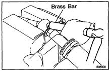 STEERING POWER STEERING GEAR SR45 (c) Using a brass bar and hammer, stake the washer. NOTICE: Avoid any impact to the rack. 16.