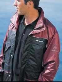 Breathable inner lining, vent slits, integral zipped hood concealed in collar and front zip with press-stud wind flap.