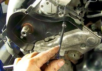 a great job here.) Many common gear pullers will do the job. Leave the loosened bolt in place.