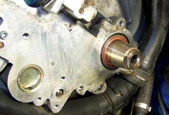 Step 25. Repeat the cam seal replacement process on the left bank camshaft. Remove the cam gear and rear timing cover.