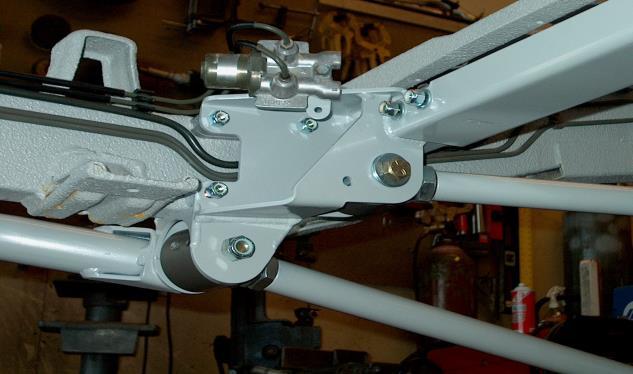 Install the upper control arm into the pocket in the front drop-out crossmember and the upper control arm bracket on the front axle housing using 9/16-18x4 bolts & nylocs.