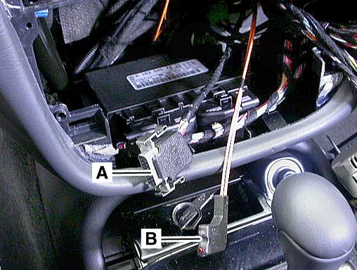Proceed to Section G if the vehicle is not equipped with Parktronic. 6. Remove the instrument panel center section (Figure 17). Refer to WIS document AR68.