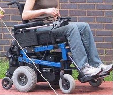 The manual wheelchair (Quickie GP, Sunrise Medical Ltd.) was a rigid frame design with 127 mm (5 ) diameter polyurethane tires, and standard 61 mm (24 ) diameter rear wheels.