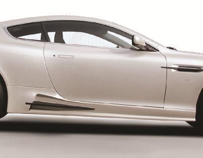Front bumper, DB9 FS EU37 EU-version without parktronic sensors With integrated carbon trims visible carbon fibre primed without clear coat, Hella Xenon driving lights and daytime running lights,