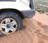 Lower pressure increases the size of your tyres footprint, increasing its ability to stay on top of the sand instead of digging in, or its flotation characteristics.