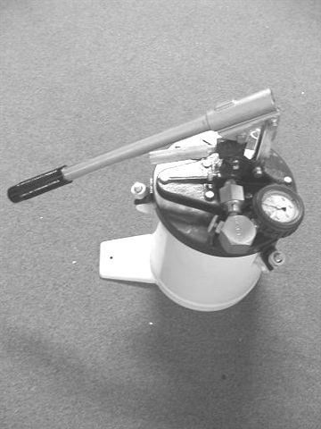 41 Lubricant Guns High-Pressure Bucket Pump Model 6713-4, 6713-30 The major components of model 6713-4 bucket pump assembly consist of a: Hand-operated pumping mechanism with bleed valve, relief