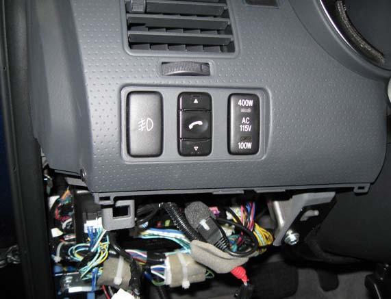 NOTE: The switch cable will continue routing towards the glove box. Fig.