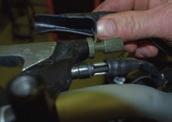 3) After adjusting, tighten the clutch ring nut. Checking the brake lever free play Periodic maintenance and adjustment Brake light switches 1 2 There should be no free play at the brake lever end.